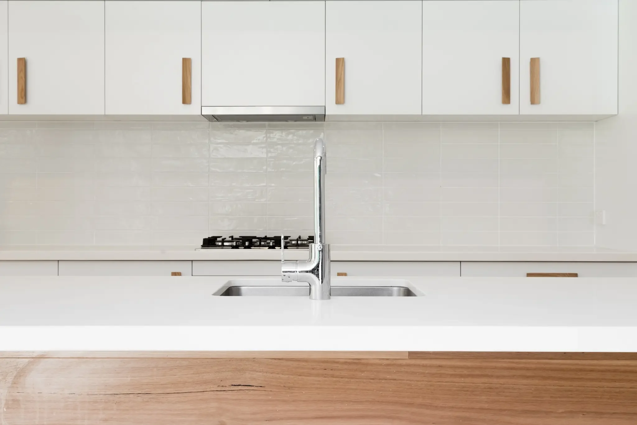 Minimal kitchen in dual occupancy home