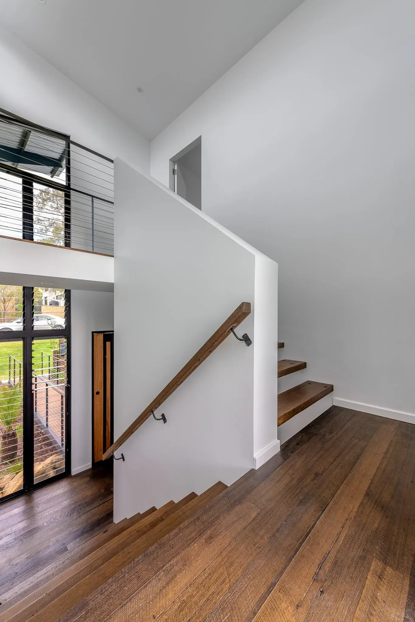 Staircase with timber and natural light