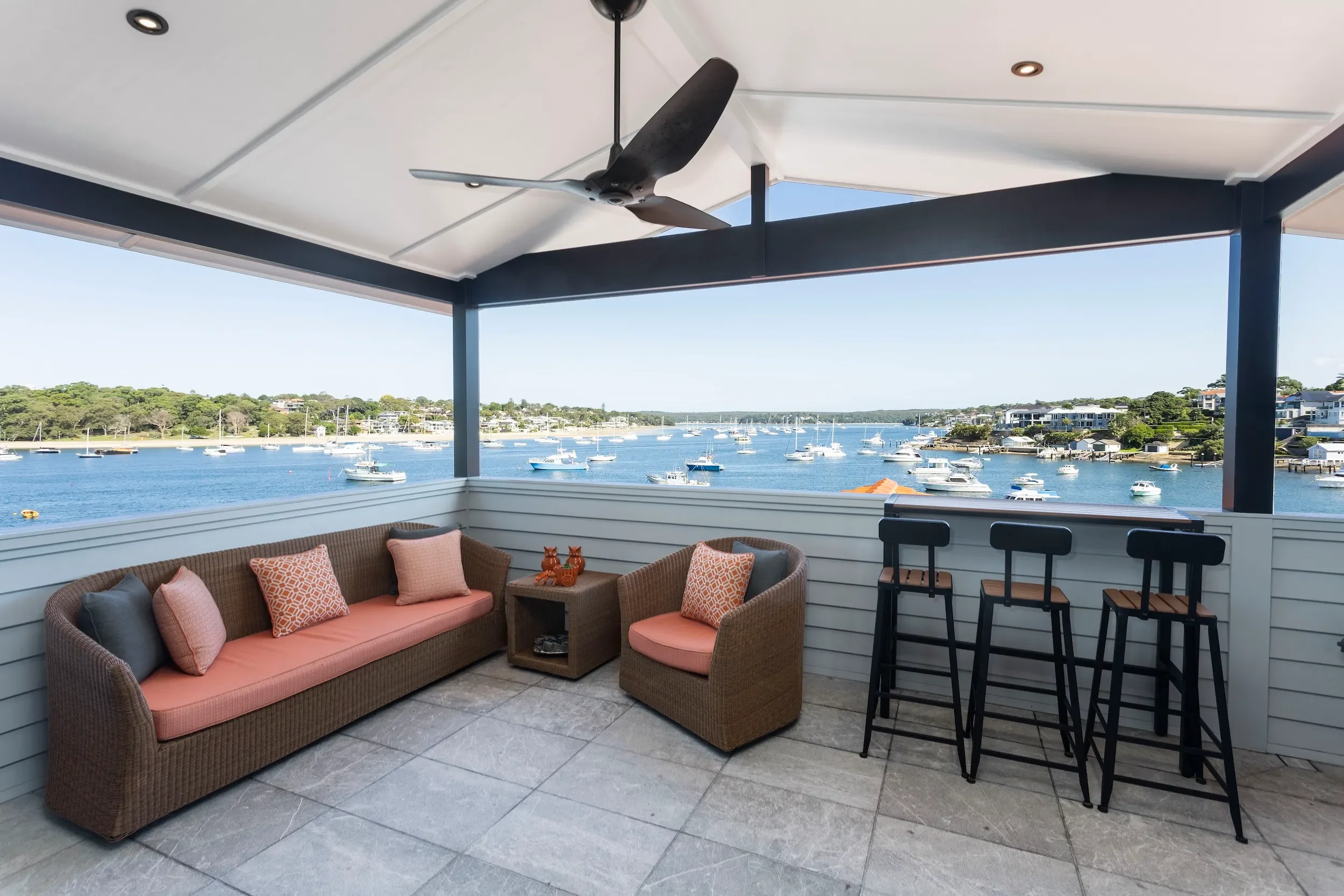 Outdoor living terrace overlooking water
