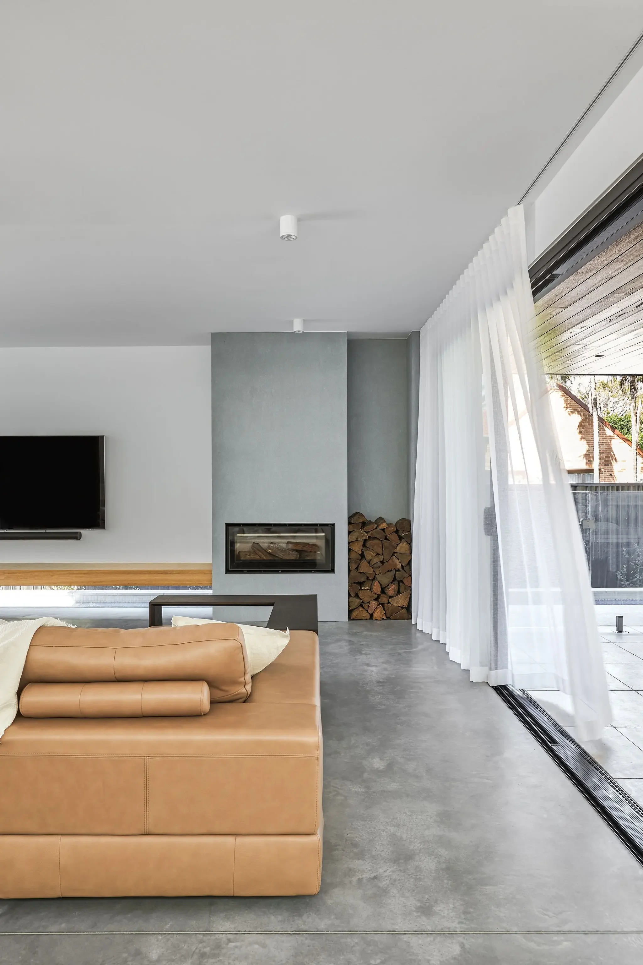 Living room filled with natural light in modern home