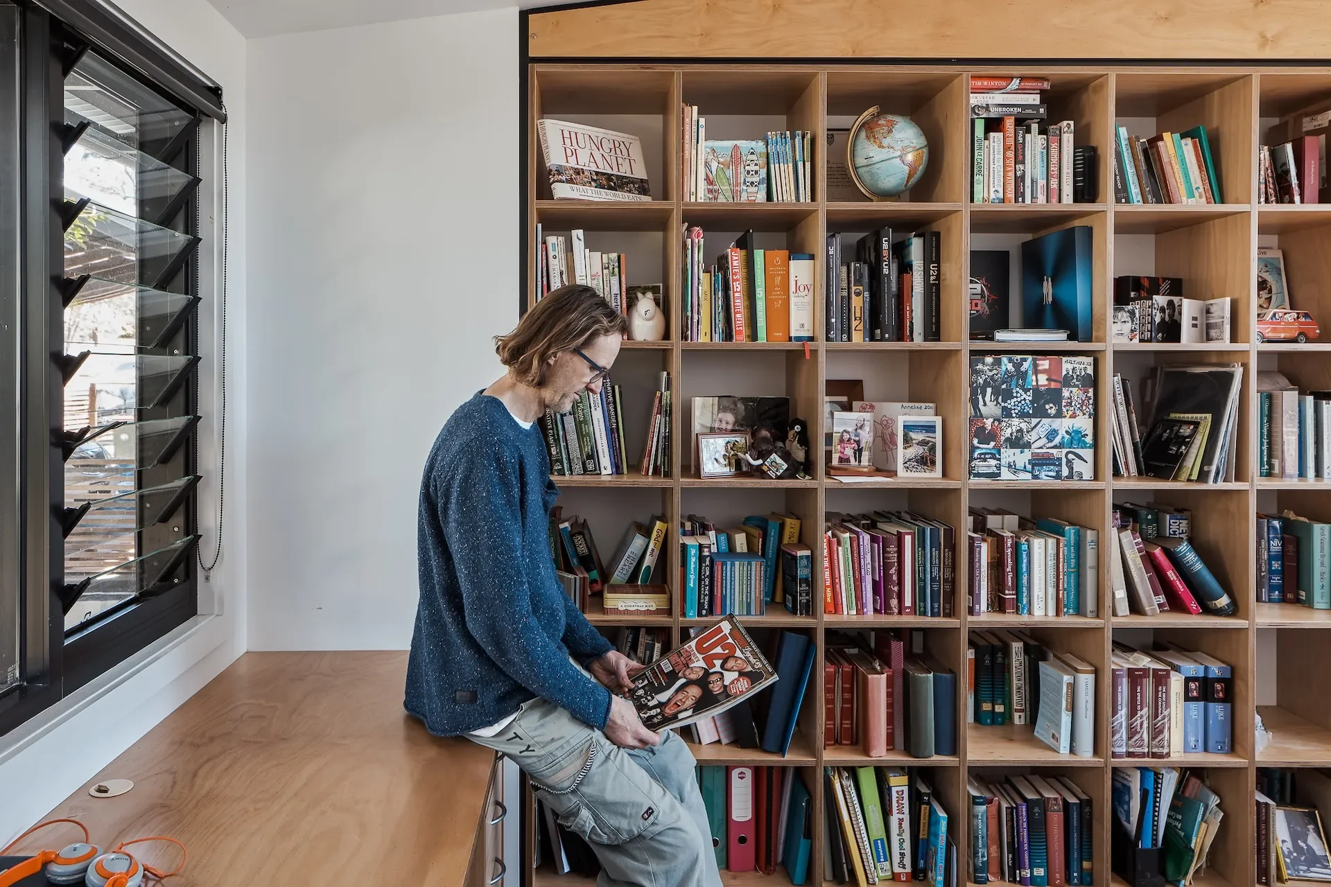 Custom bookshelf and study space designed for a family home in Gordon