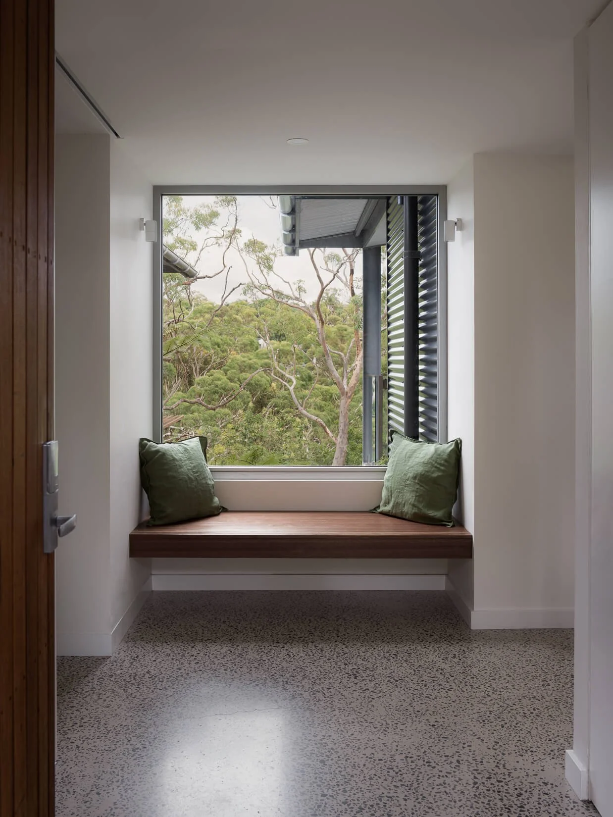 Custom joinery and reading nook in architect designed Killara home