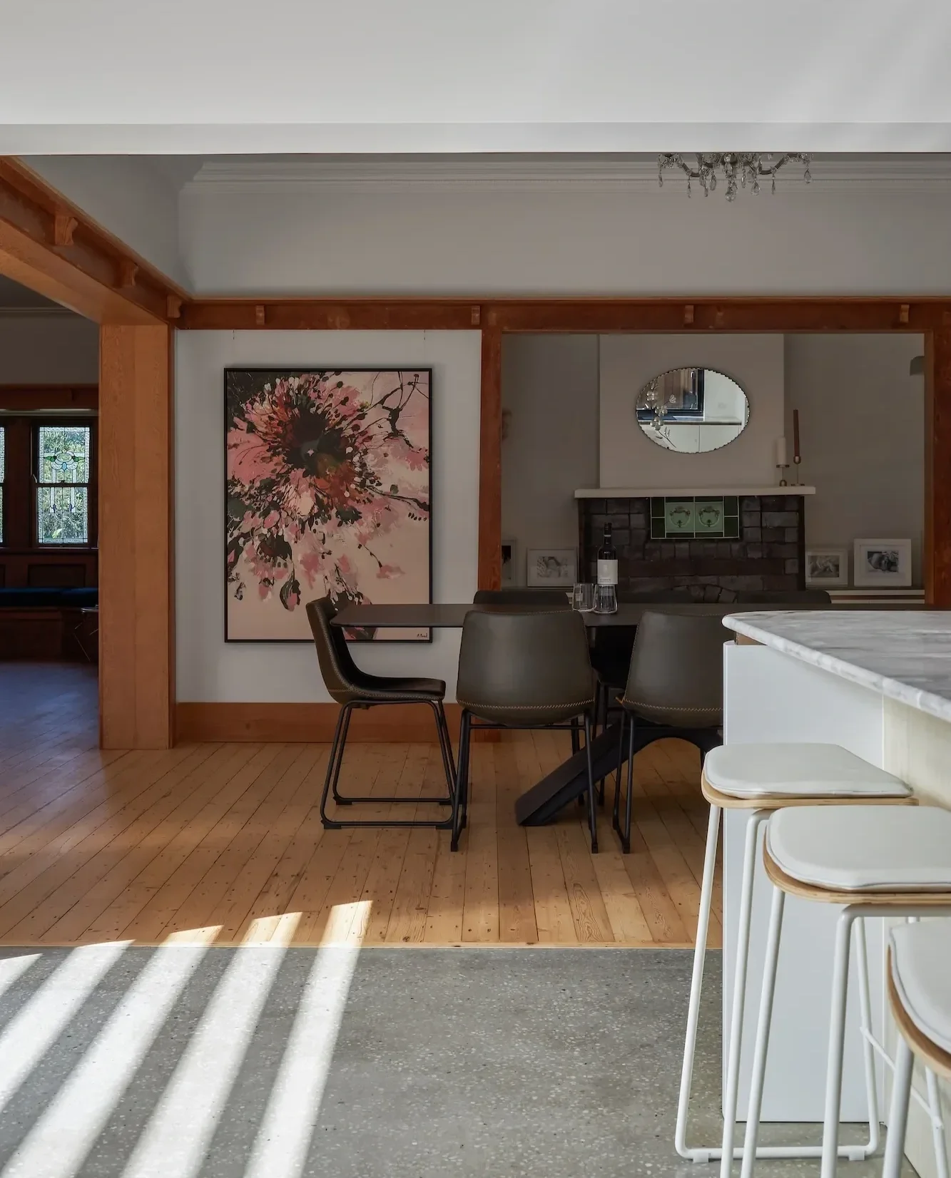 Renovated living room with fireplace and restored heritage features