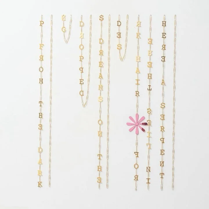 For She Dreams &ndash; Detail
Poem fragment, brass text, acrylic asterisk, paper clips, QR code to sound - &ldquo;She Dreams&rdquo; repeated in Morse code, created from lark song recordings. 

Currently showing at @royal_sculptors Summer Show curated