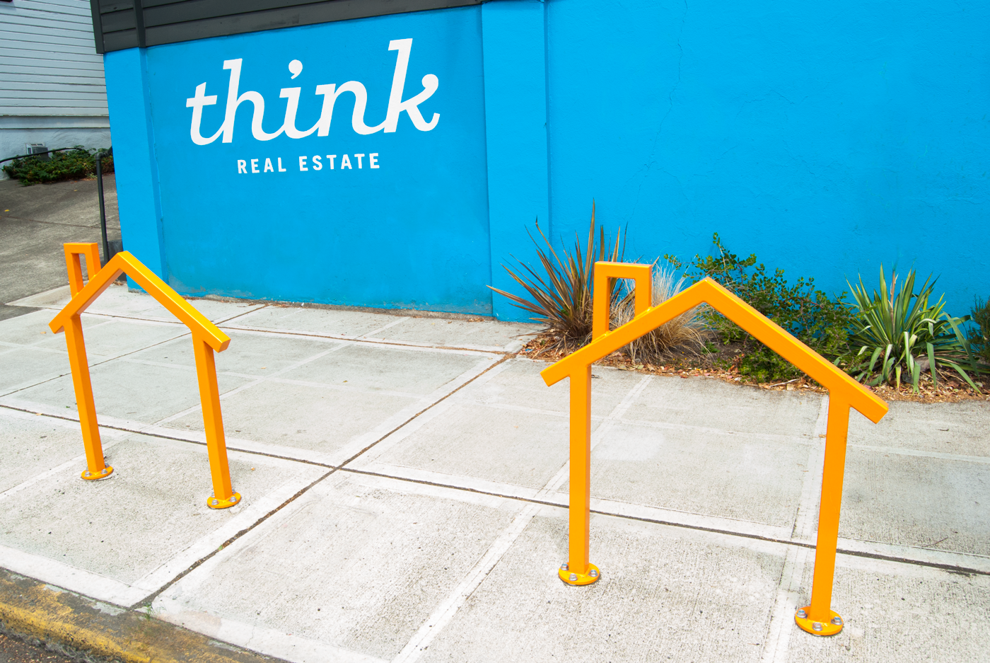 Part bike rack, part advertising for a great local real estate company.