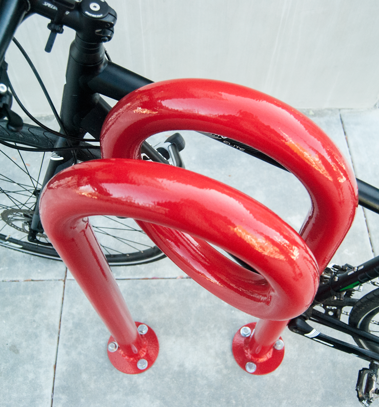 Huntco_Corkscrew_Bikerack_bike_Above_spacing.png