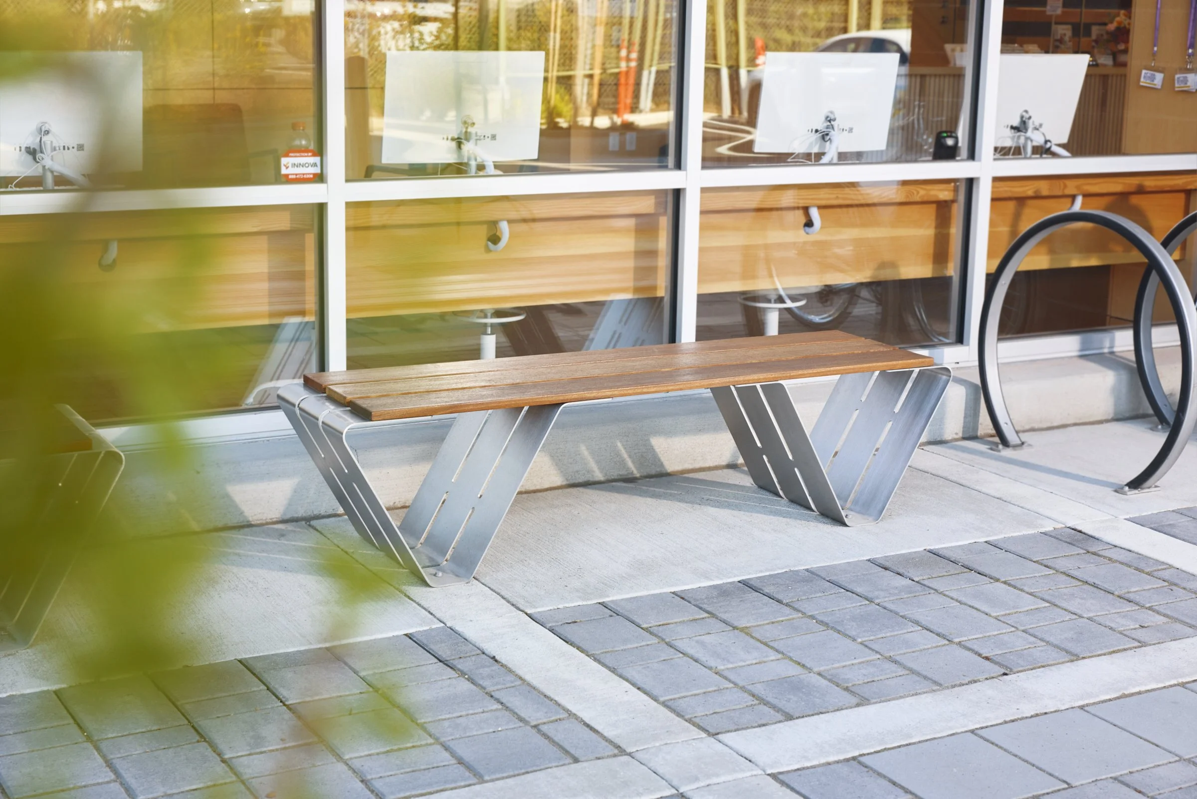 Outdoor space at a modern office in Canby, Washington. Huntco Douglas Bench, Sellwood Bike Rack, commercial benches, commercial bike racks