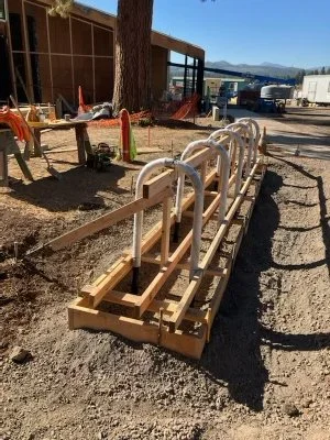 Kirby Nagelhout installation, well-wrapped racks avoid concrete mess, dings and scratches.
