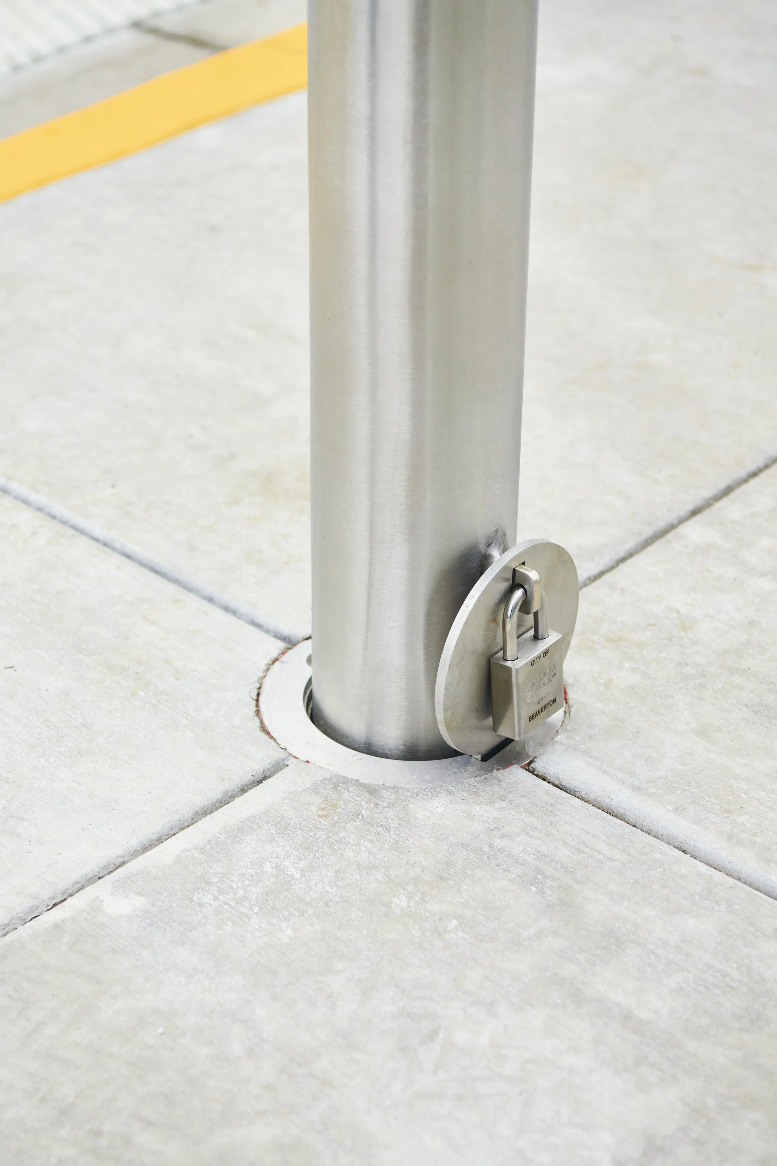 Close up of a clean and precise install of a removeable bollard.