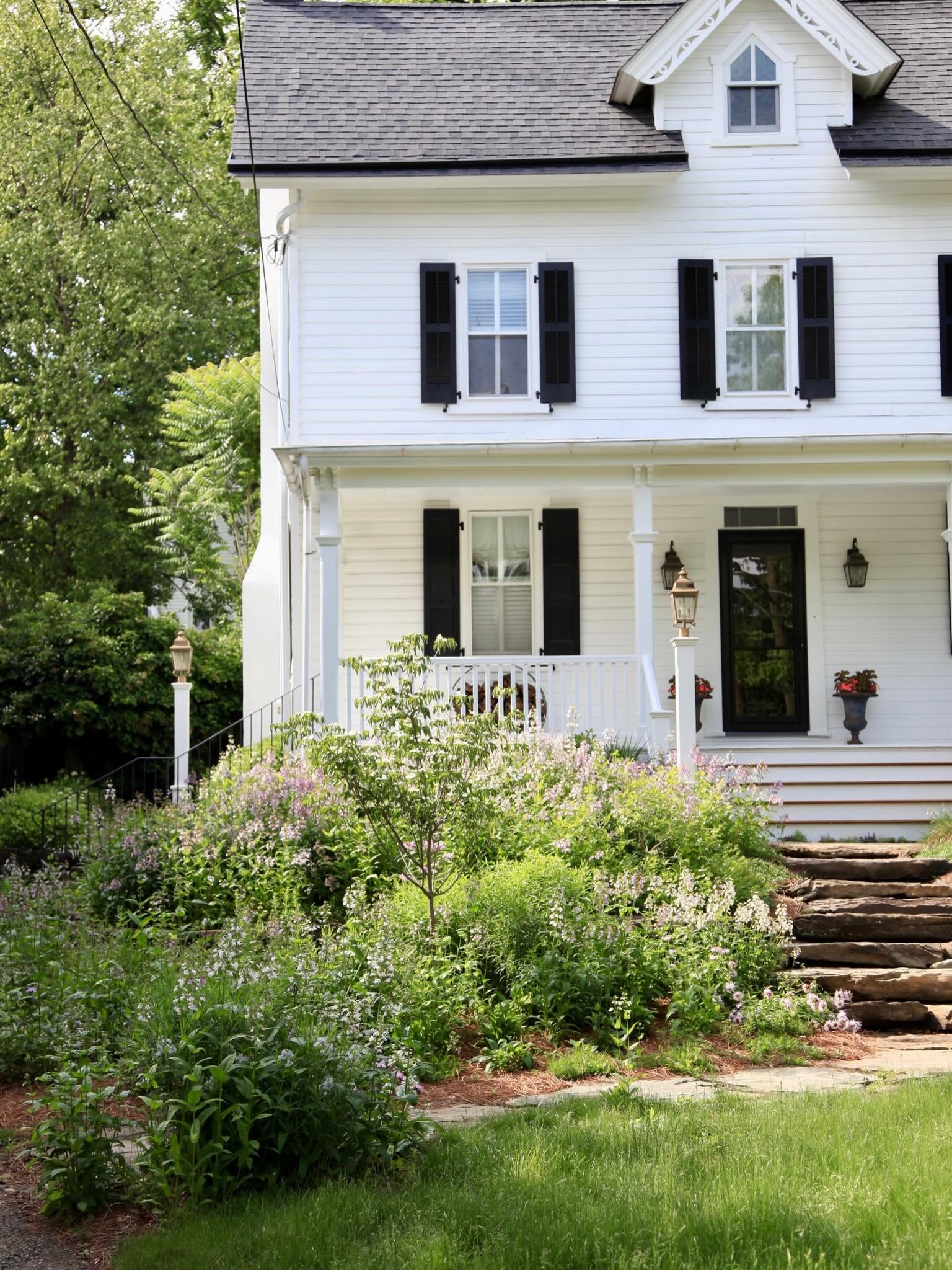 This gorgeous circa 1850 colonial is located at the bottom of a slope and had ongoing issues with runoff from the neighbor&rsquo;s driveway and yard.  Our solution was to collaborate with the water on the property and design with it. 

During spring&