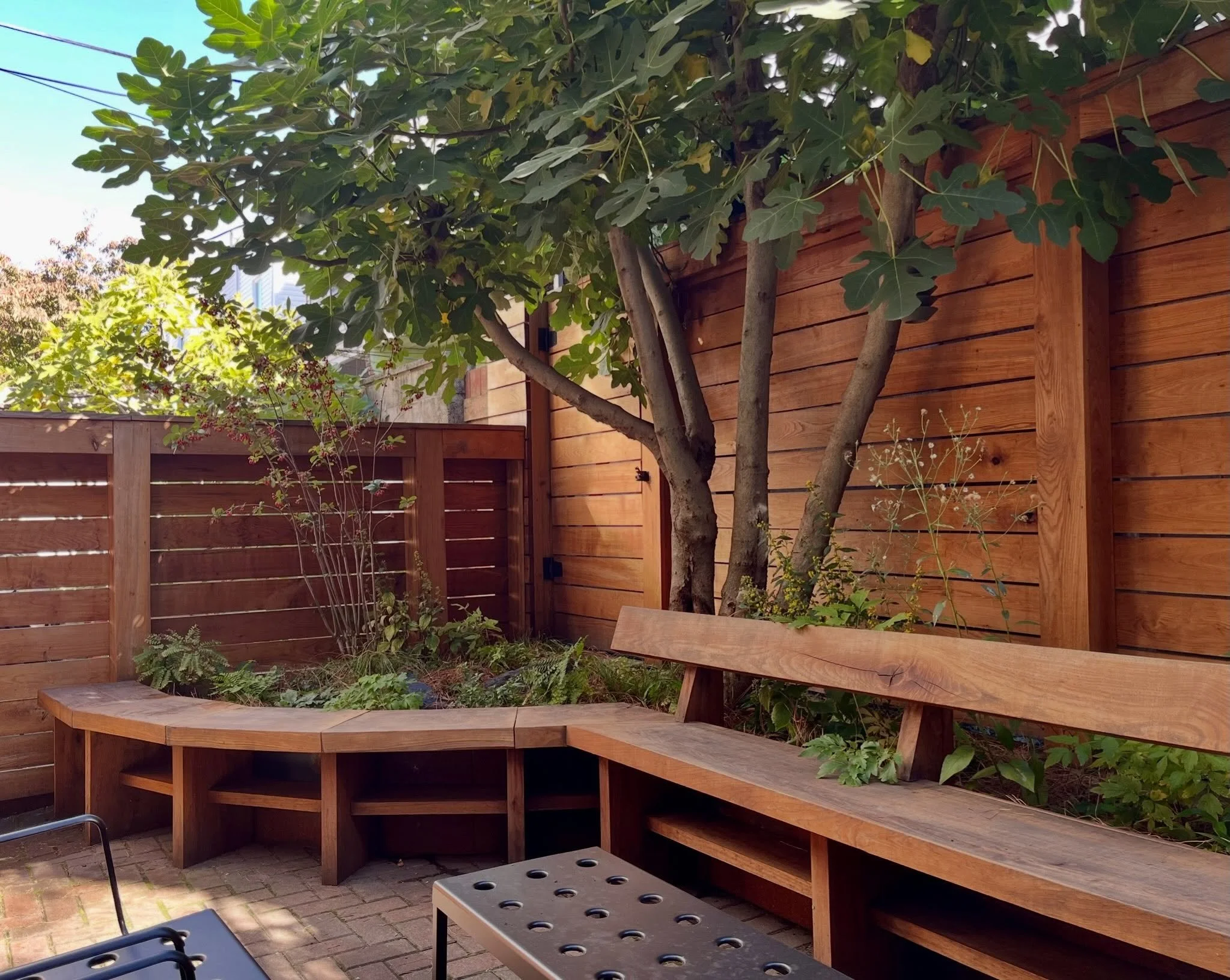 One of the interesting things about working in historic neighborhoods is the archaeological uncovering of layers and layers of changes to the built environment over many decades.

In this Philadelphia backyard, the previous tenant had paved over ever
