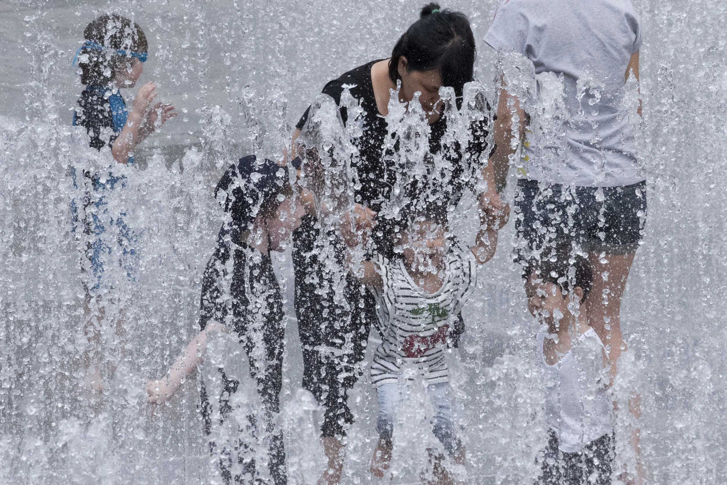 Figs 4 - 7: Different human interactions with the Jepp Hein fountain
