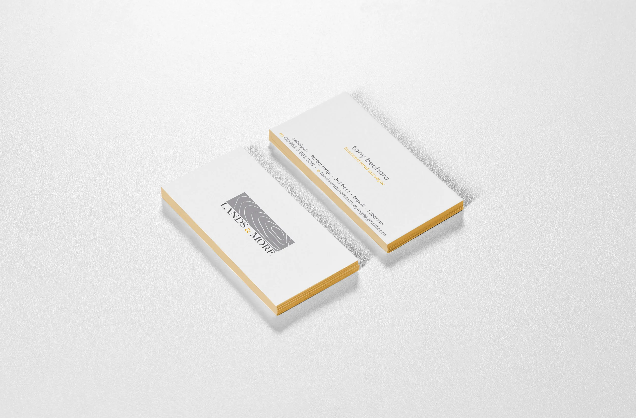 The business cards were triplexed, whereby three sheets of paper are glued together. The effect achieved is commonly referred to as ‘edge-painting’ or ‘edge-tipping’ because a sheet of paper of a different colour is inserted between the two outer sheets, producing a coloured edge, which in this case was orange-yellow. Antinoe Brut white 270gr and Sirio Gialloro 210gr paper was used to create a 750gr-thick business card. The logo was then embossed.