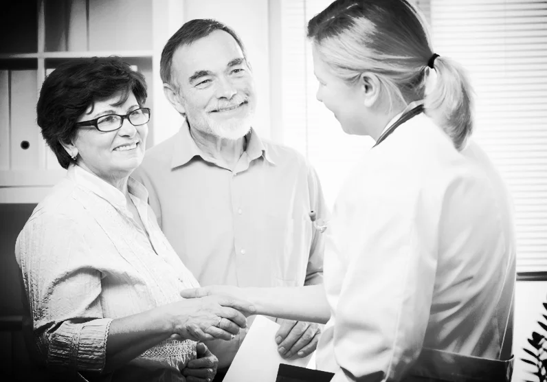 Older couple thanking doctor-small.jpg