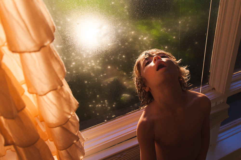 Cathlin McCullough Photography - Boy in magical window light