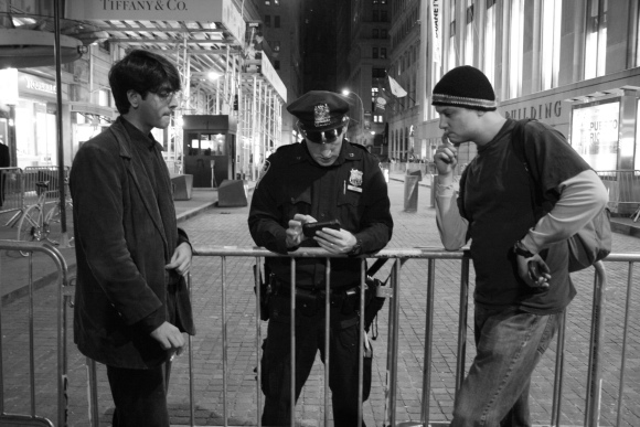 8 October 2011 A policeman stationed in front of the Wall Street stock exchange building. The streets are desert. The Occupy Wall Street protesters are a few blocks away.