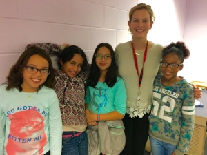 LiveGirlTalk mentor Sara Nelson with members of her group at the Carver Center.