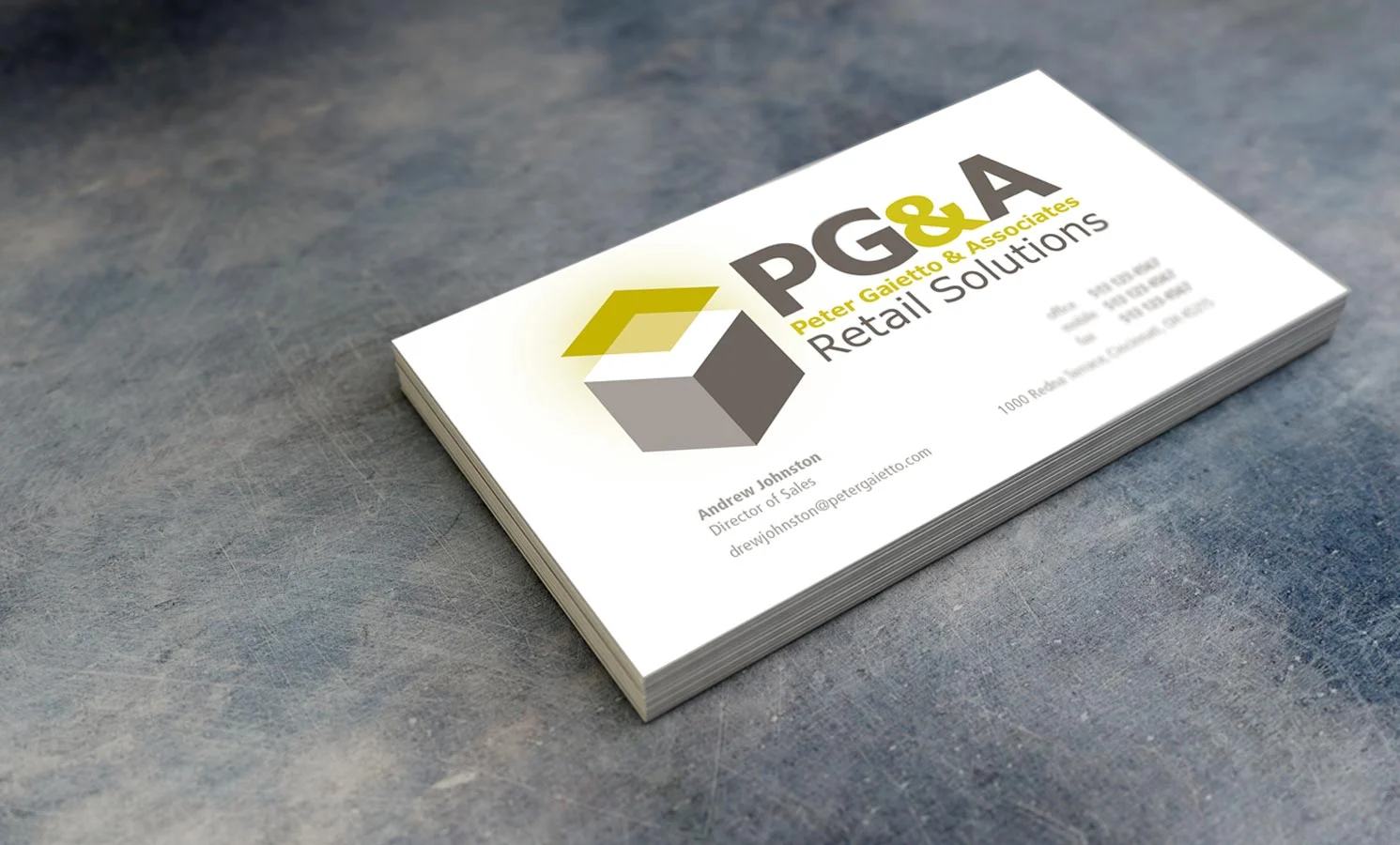 Business card layout and color experimentation on existing logo.