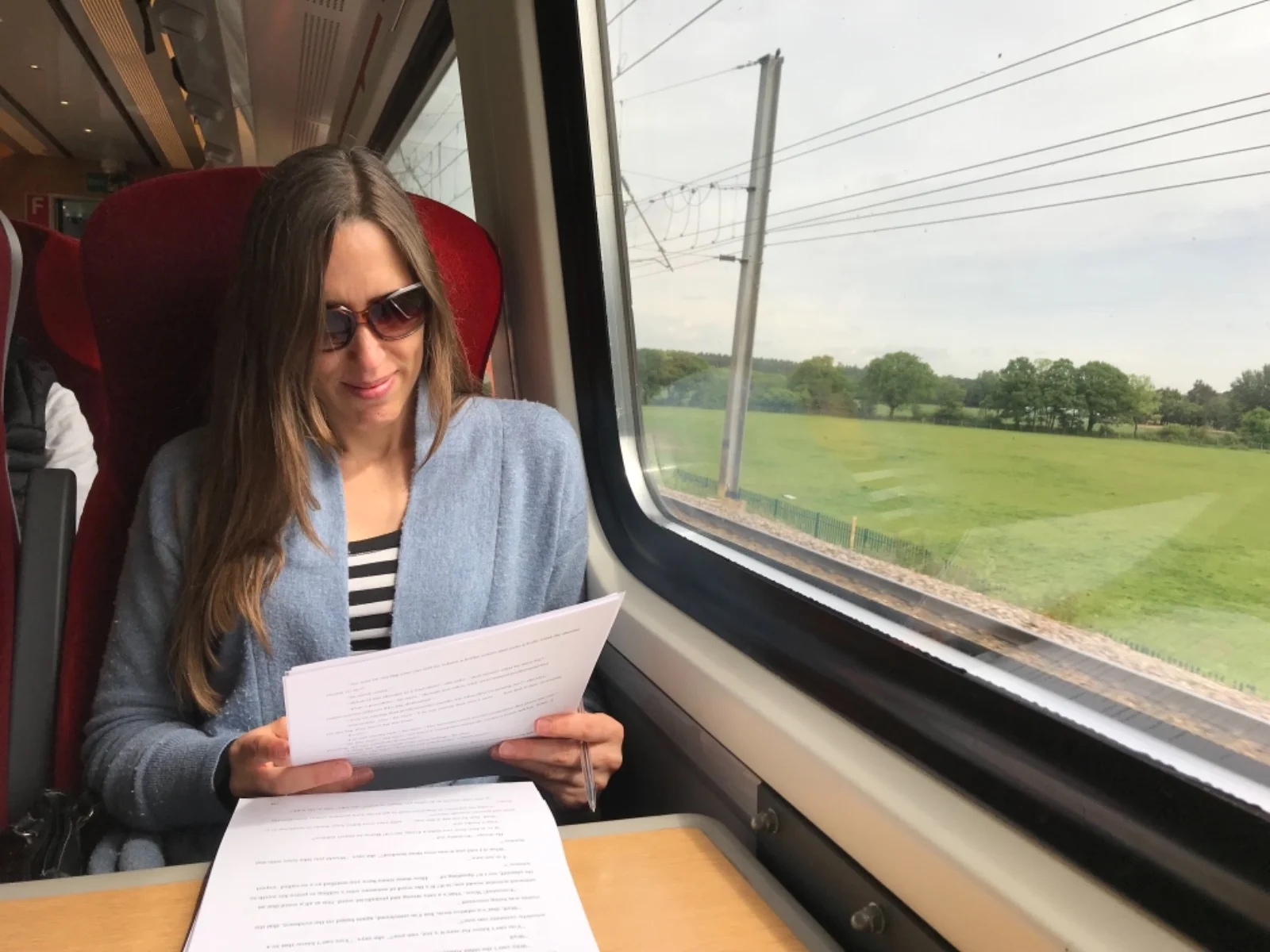 One of my lovely editors working on my new novel on a train to Edinburgh.