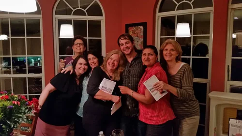 Michael Lister with a book club holding copies of Innocent Blood