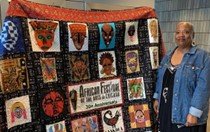 Patrice Bowen next to quilt.jpg