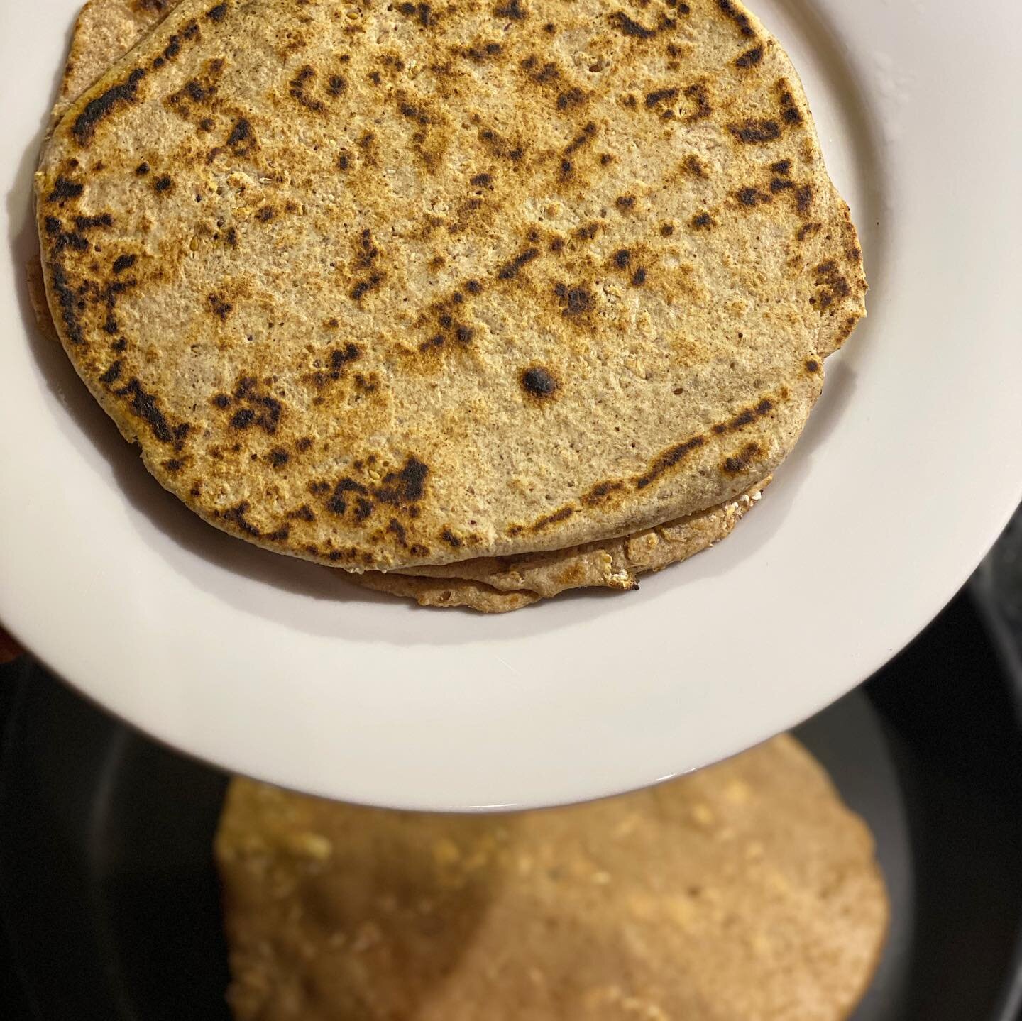 You can make your own healthy flatbread in 15 min.. All you need is: 
2/3 cup warm water
1 tsp salt
1/4 cup olive oil
2 cups whole wheat flour
1/4 cup rolled oats 
Combine the warm water and salt and let the salt dissolve.
Add the olive oil to water 