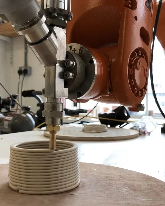 Calibration of porcelain extrusion system and a KUKA robot 🤖☺️👌 ...using a customised porcelain the next steps are material, tool path and hardware / software optimisation.. We’re developing generative design systems which will allow aspects of machine learning towards biomimetic architectural structures @autodesk ..more to come 🦅 #kukarobotics #kukaroboticsuk #design #nature #inspiration #art #ceramics #generativedesign #kuka #industry40 #machinelearning #ai #architecture #science #materialscience #porcelain #art #sculpture #software #3dprinting #autodesk #wip #experiment #robotics #engineering #sustainability #energy #clay #technology
