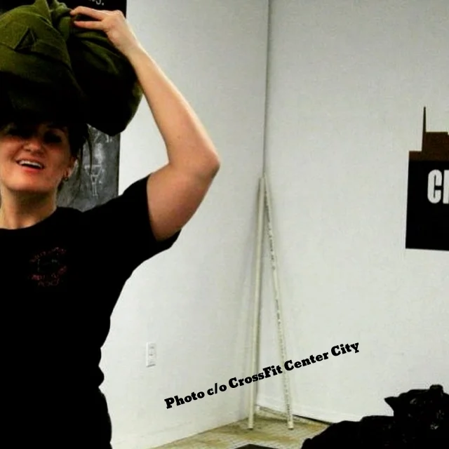 Resting a sandbag on my head at CrossFit Center City, circa 2009-ish. 