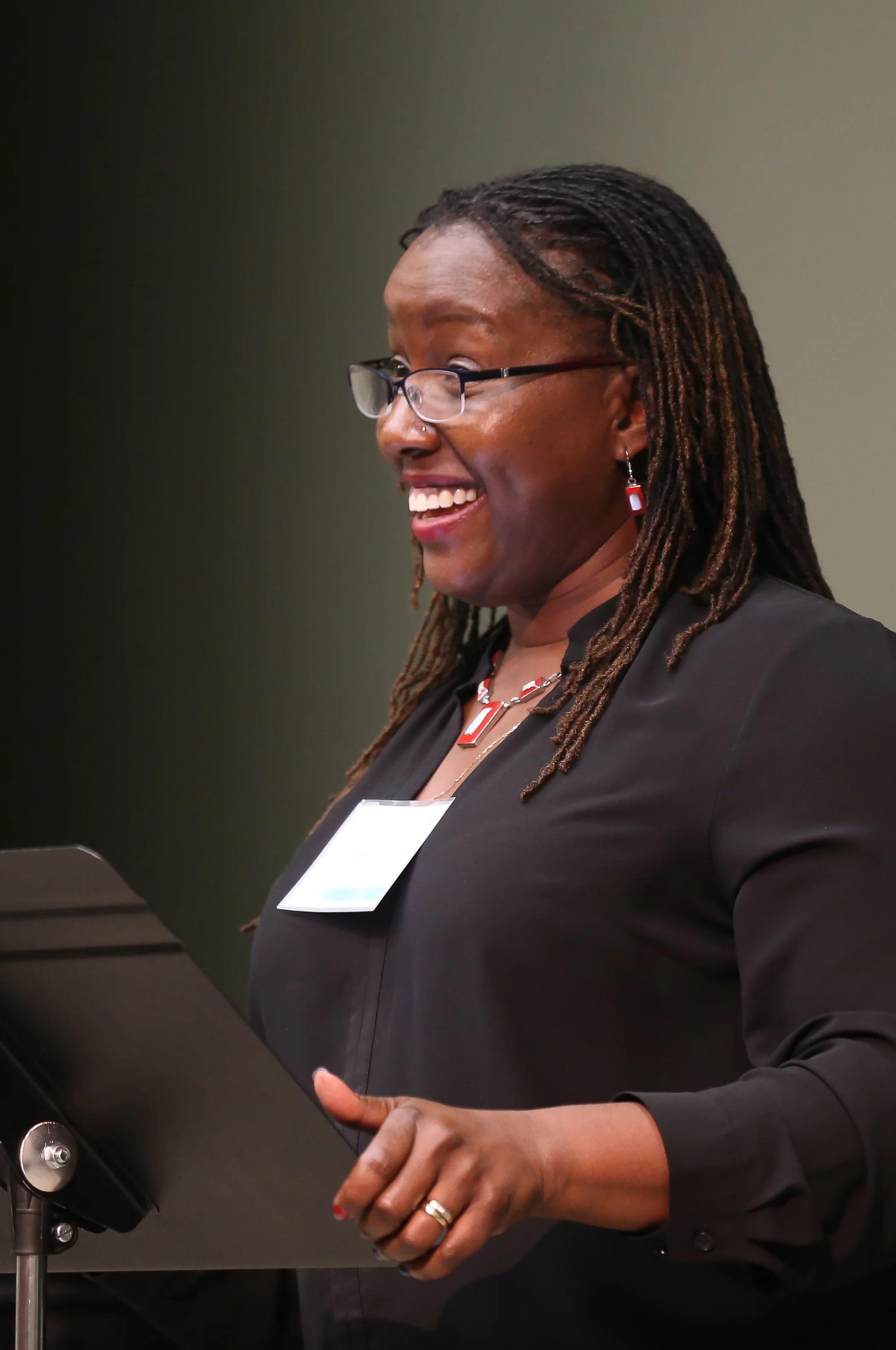 Nataki Garrett speaking at StateraCon.