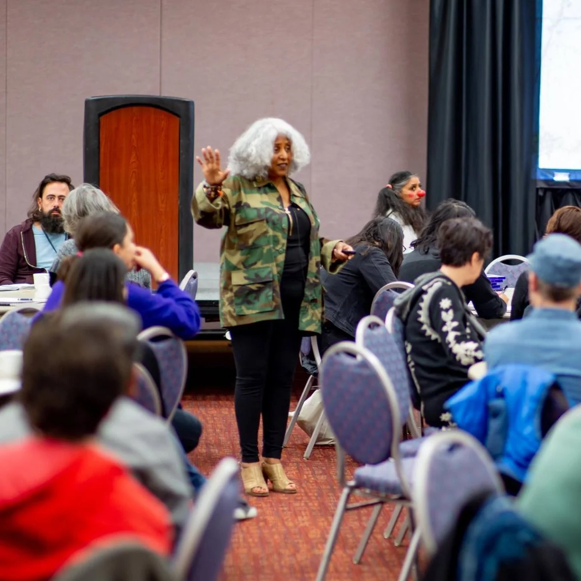 Makani Themba leading a plenary about the collective radical imagination.