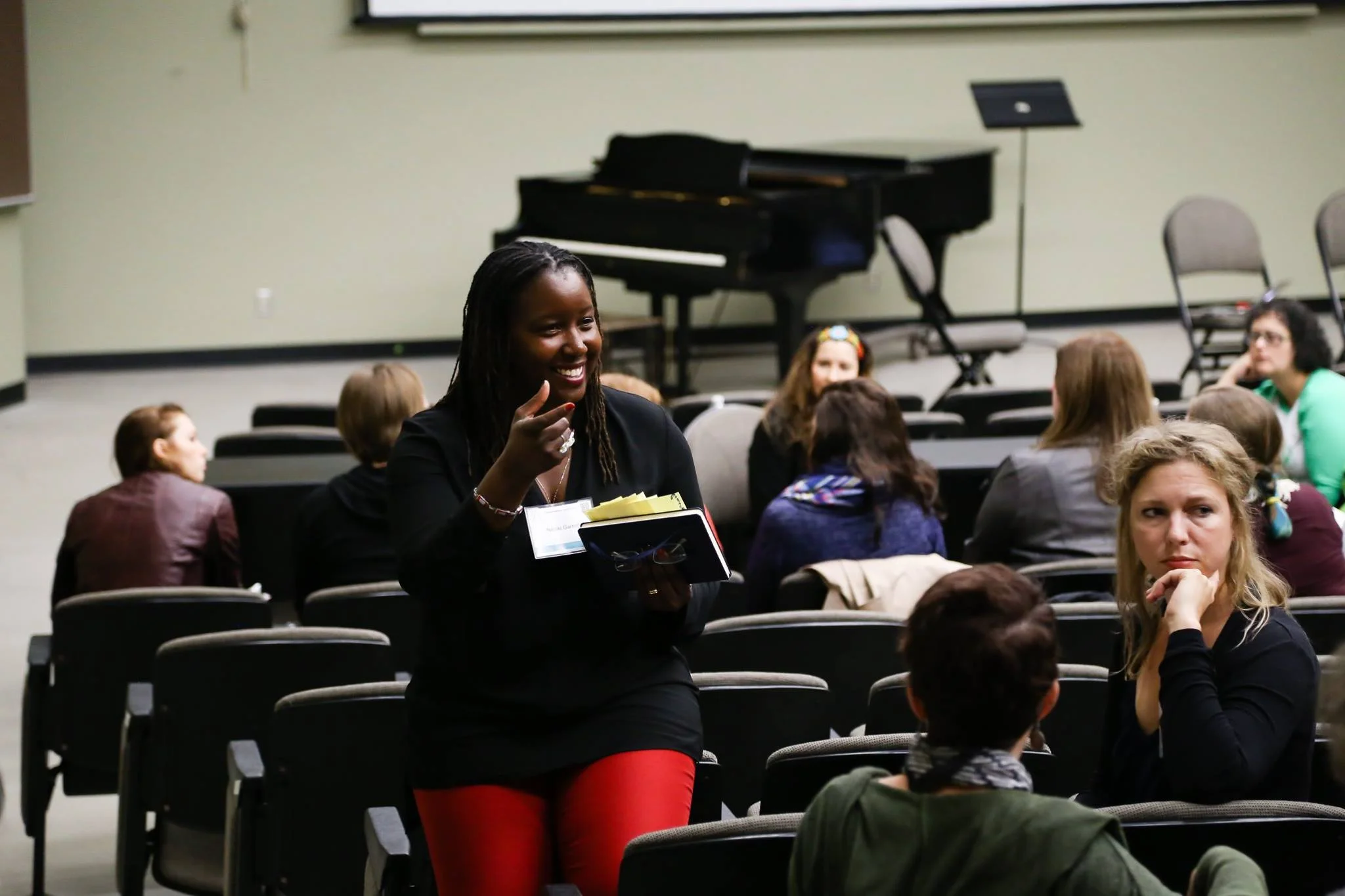 Nataki Garrett facilitating discussion during “Asking the Other Question” at StateraConIII in Milwaukee. (Photo by Malloree Delayne Hill)