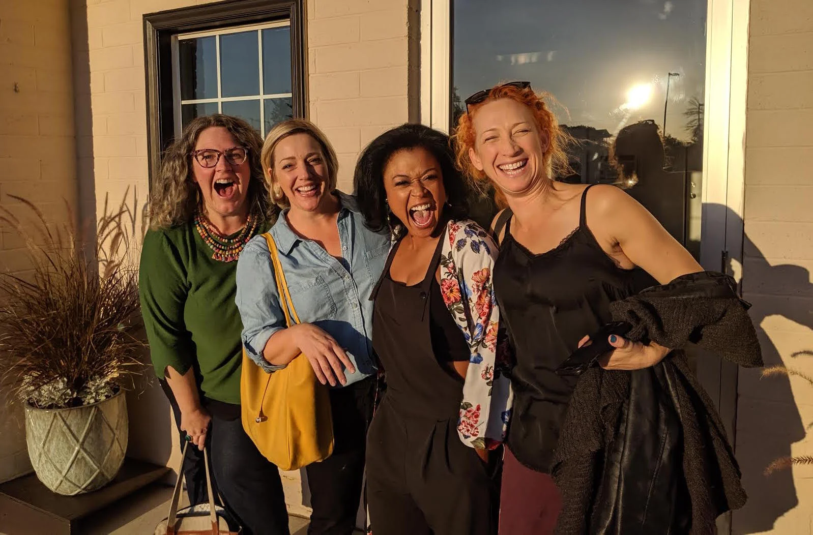 StateraArts team members in front of the new office. From left to right: Sarah Greenman, Melinda Pfundstein, Sabrina Cofield, and Kate St. Pierre.
