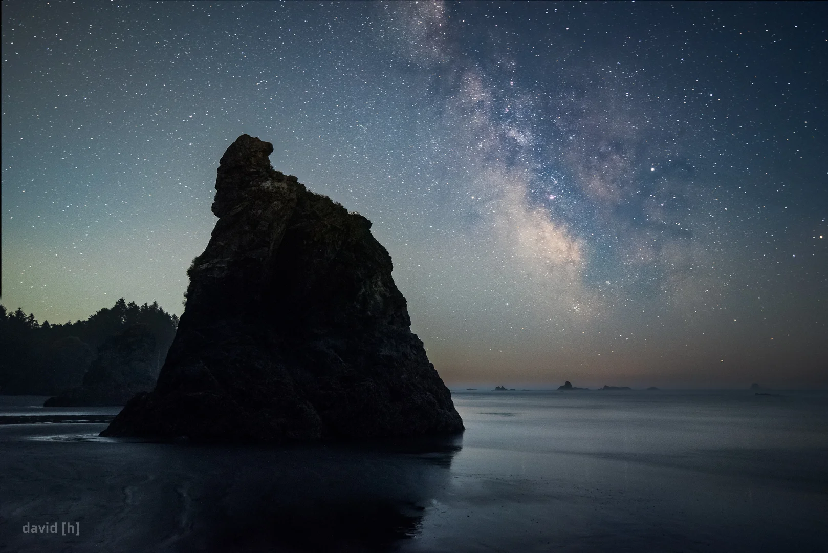 The Milky Way next to a sea stack at Ruby Beach. The rising moon starts illuminating the sky from the left, and soon thereafter would wash out the stars completely.