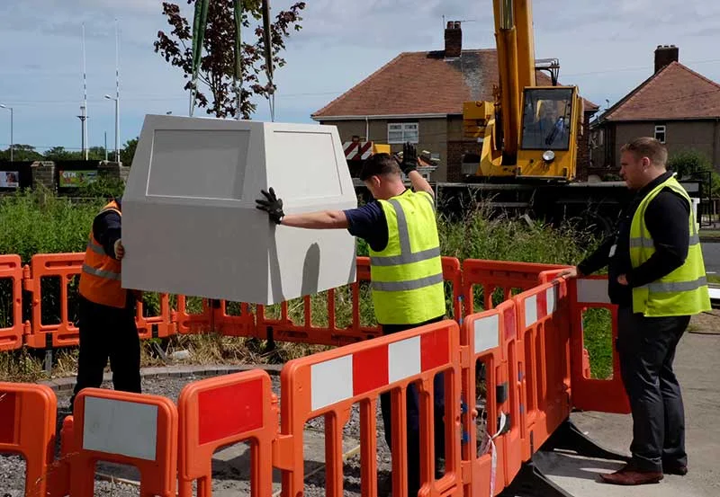 Delivering the concrete into position.