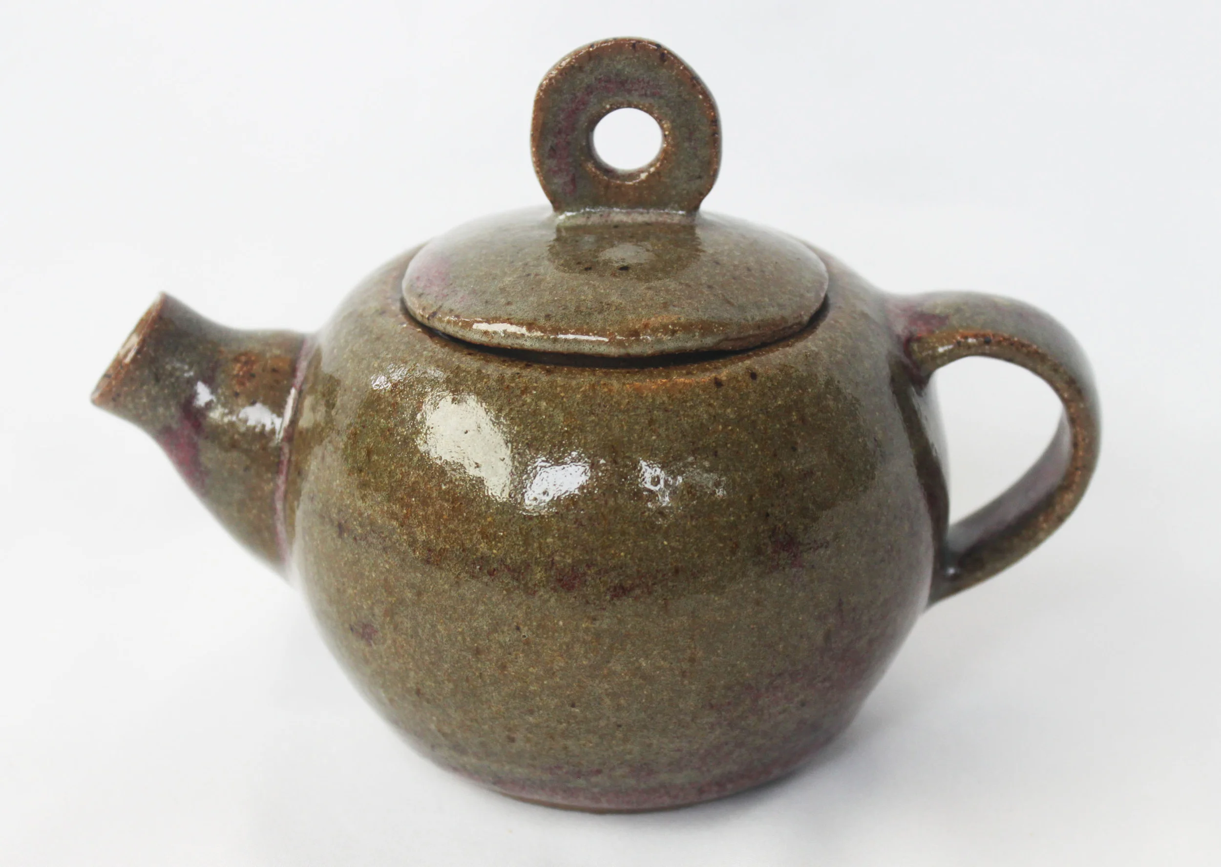 Wheel thrown tea kettle