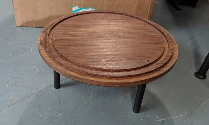 The cutting board had remove-able legs so that it could be used as a small table for serving or cutting