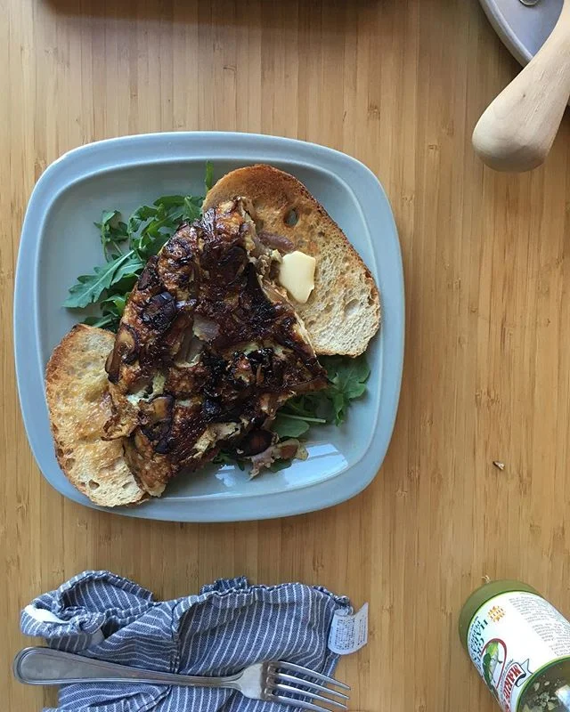 Caramelized red onion, mushroom and smoked bacon frittata for this still too-damn-cold Sunday.