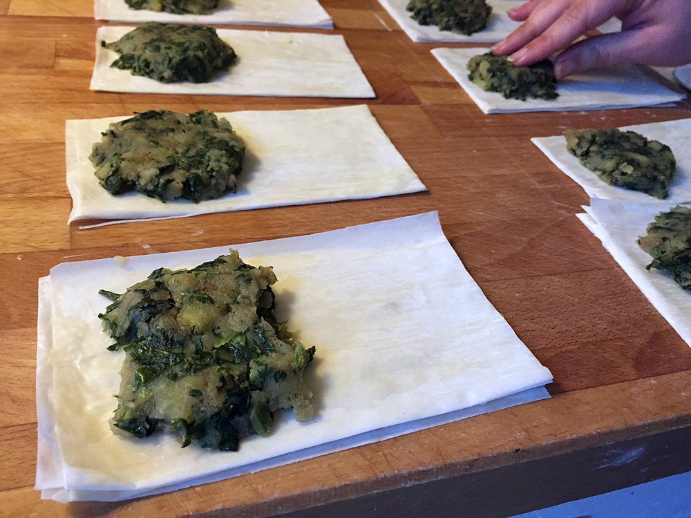 Spinach potato stuffing going in!