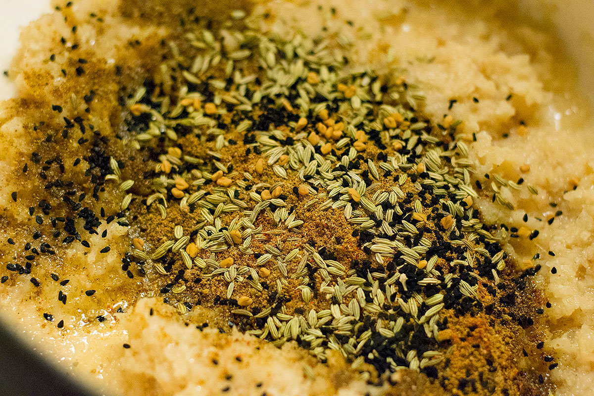 All in. The Achari Spice Mix and our beautiful Onions.