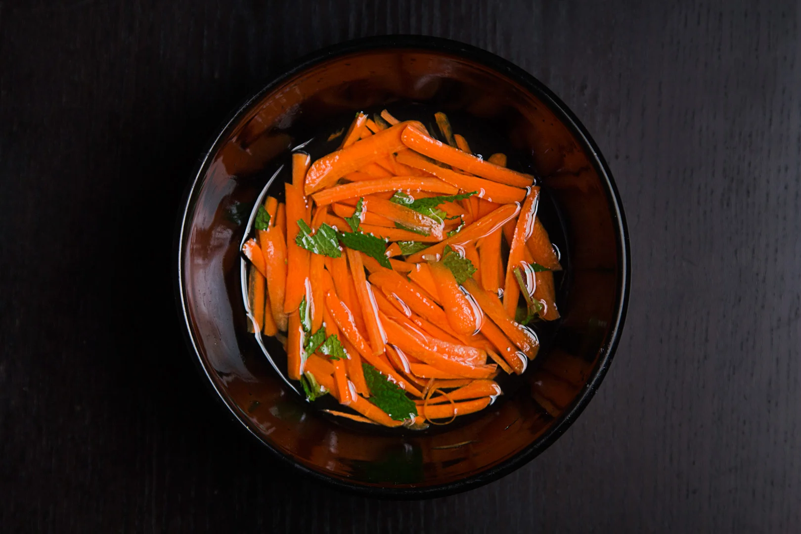 Pickled thin sliced carrots with fresh mint