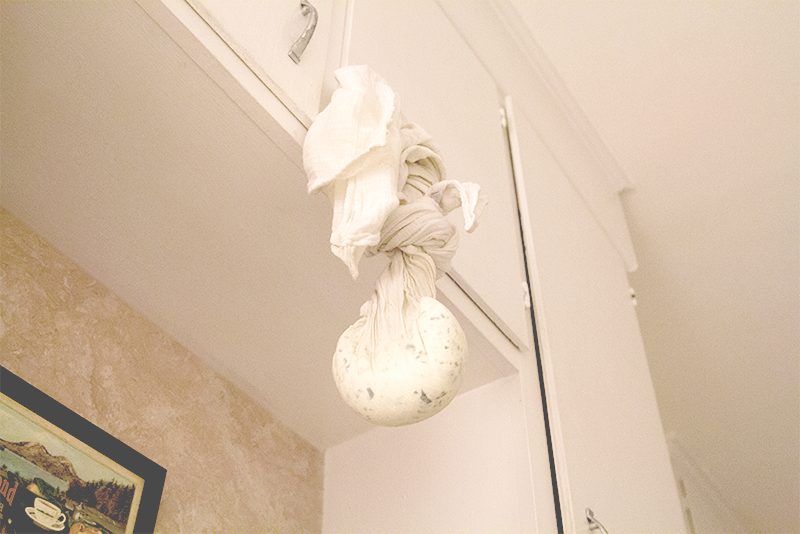 Up top! Cheese hanging to dry out.