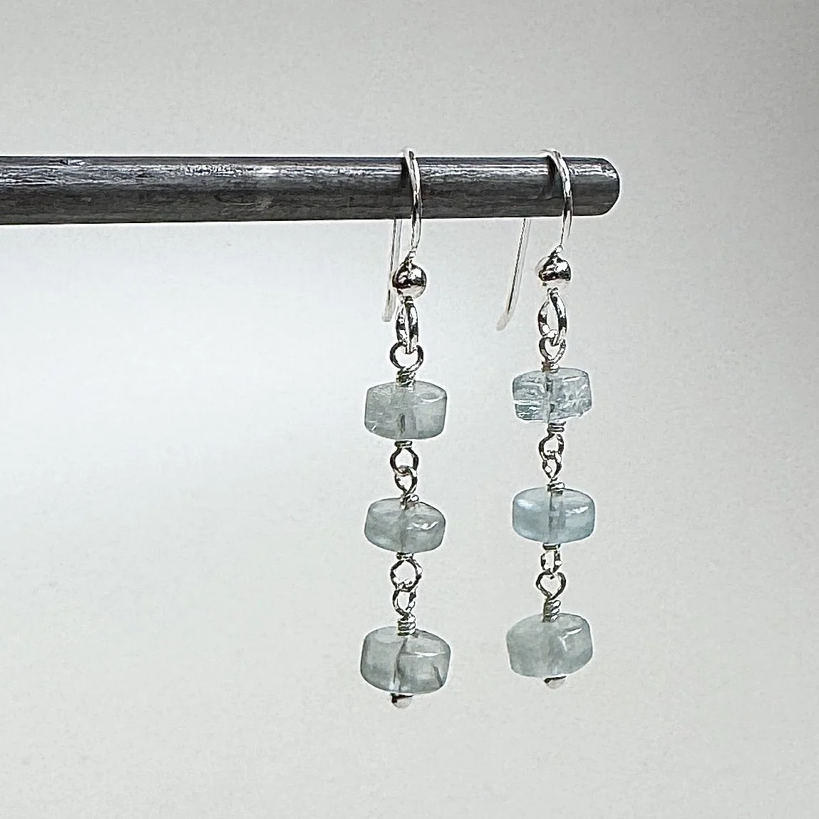 aquamarine tyre 3 wrap earrings