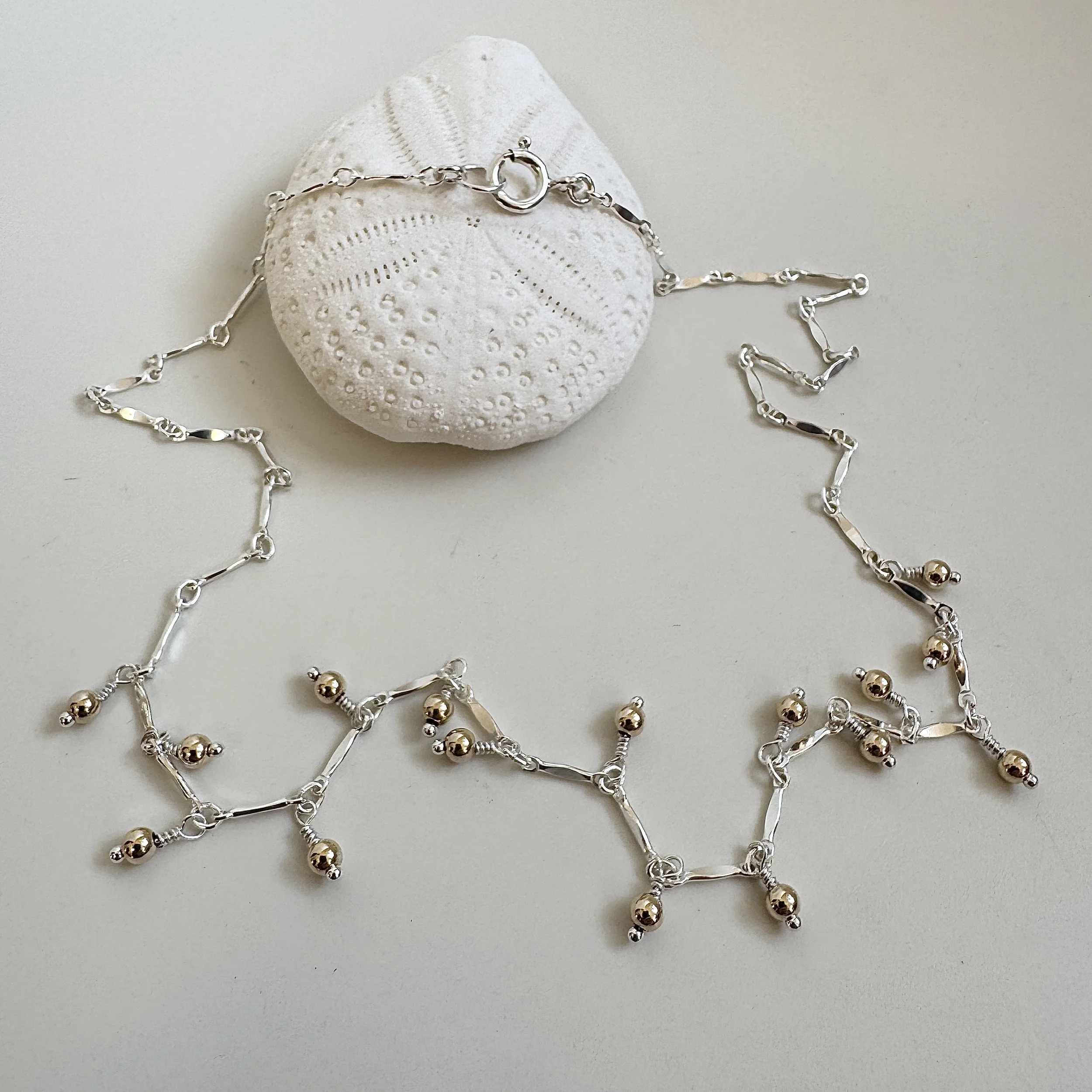 mixed metal drop necklace