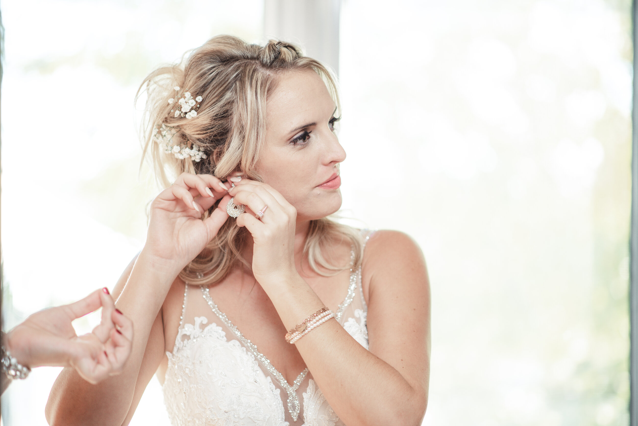 Finishing touches for the beautiful bride - eTangPhotography.com