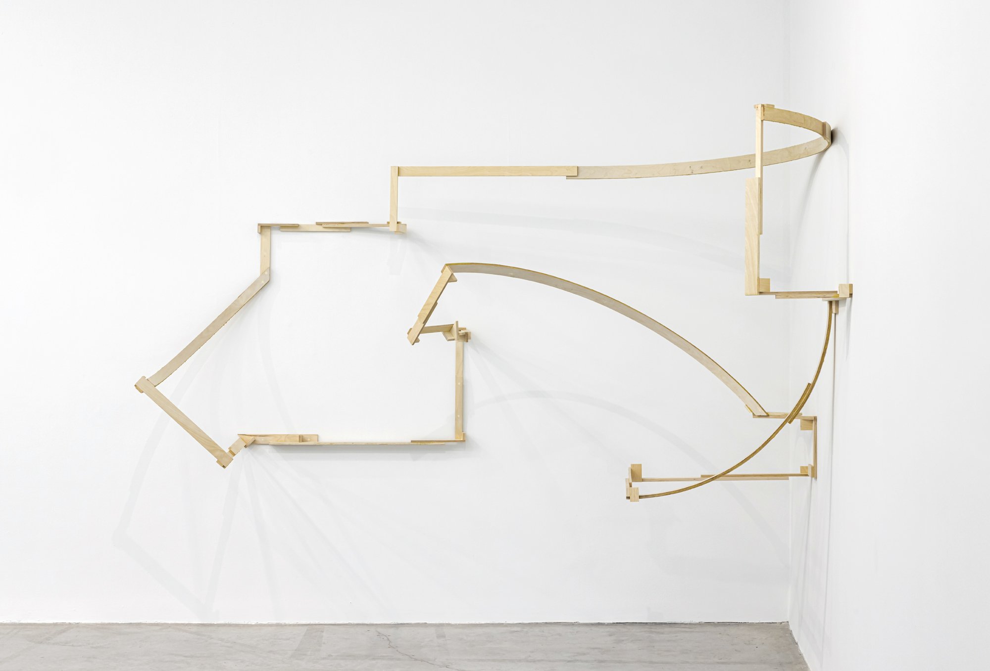   Outline 1,  2023, site-specific installation, plywood and glue, 59 x 141 x 105 