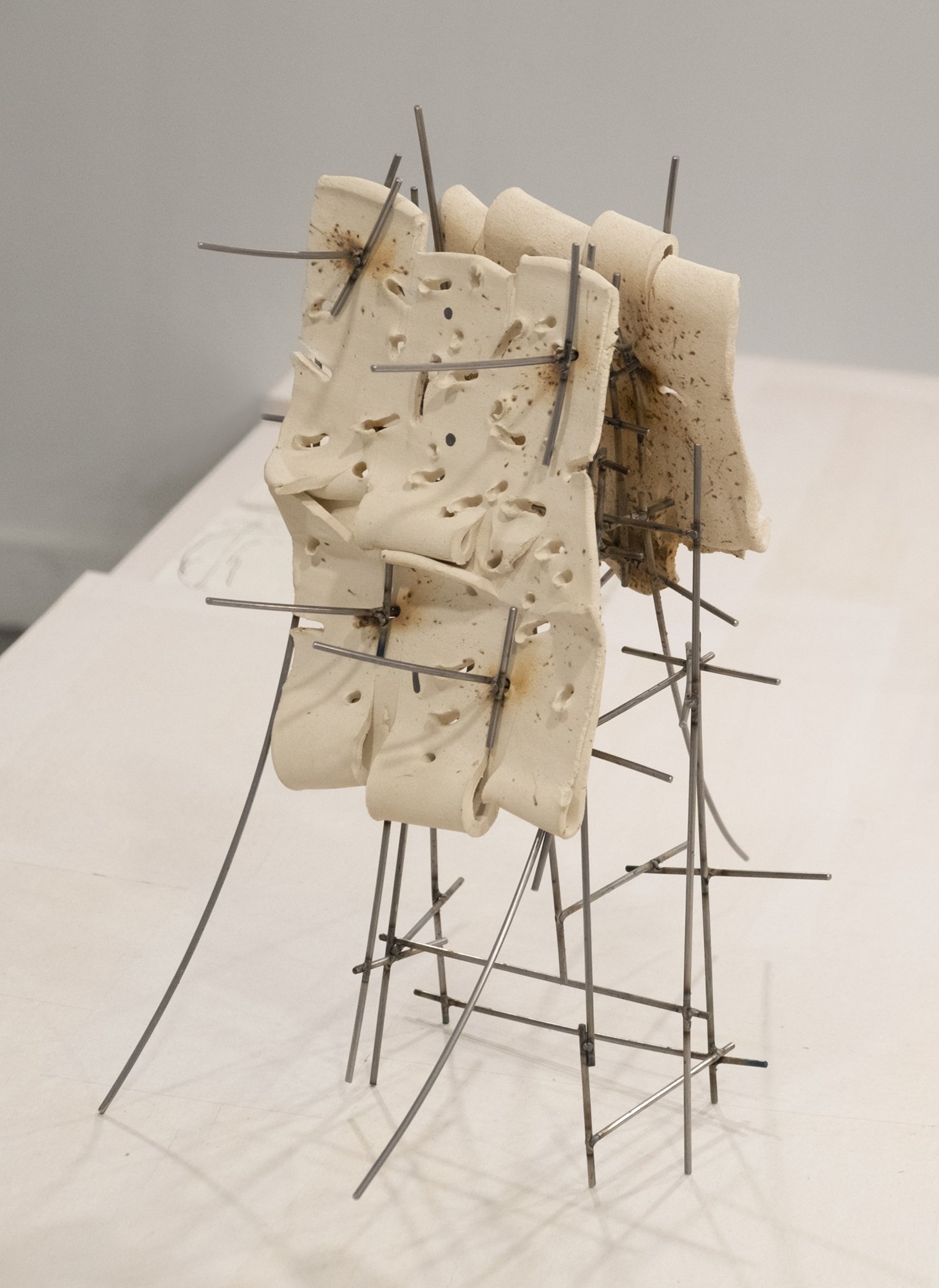   Dancers 6 , 2025, ceramic with glaze details and welded steel, 17h x 18 x 10in   Courtyard , 2026, Site-Service, Nine, New York 