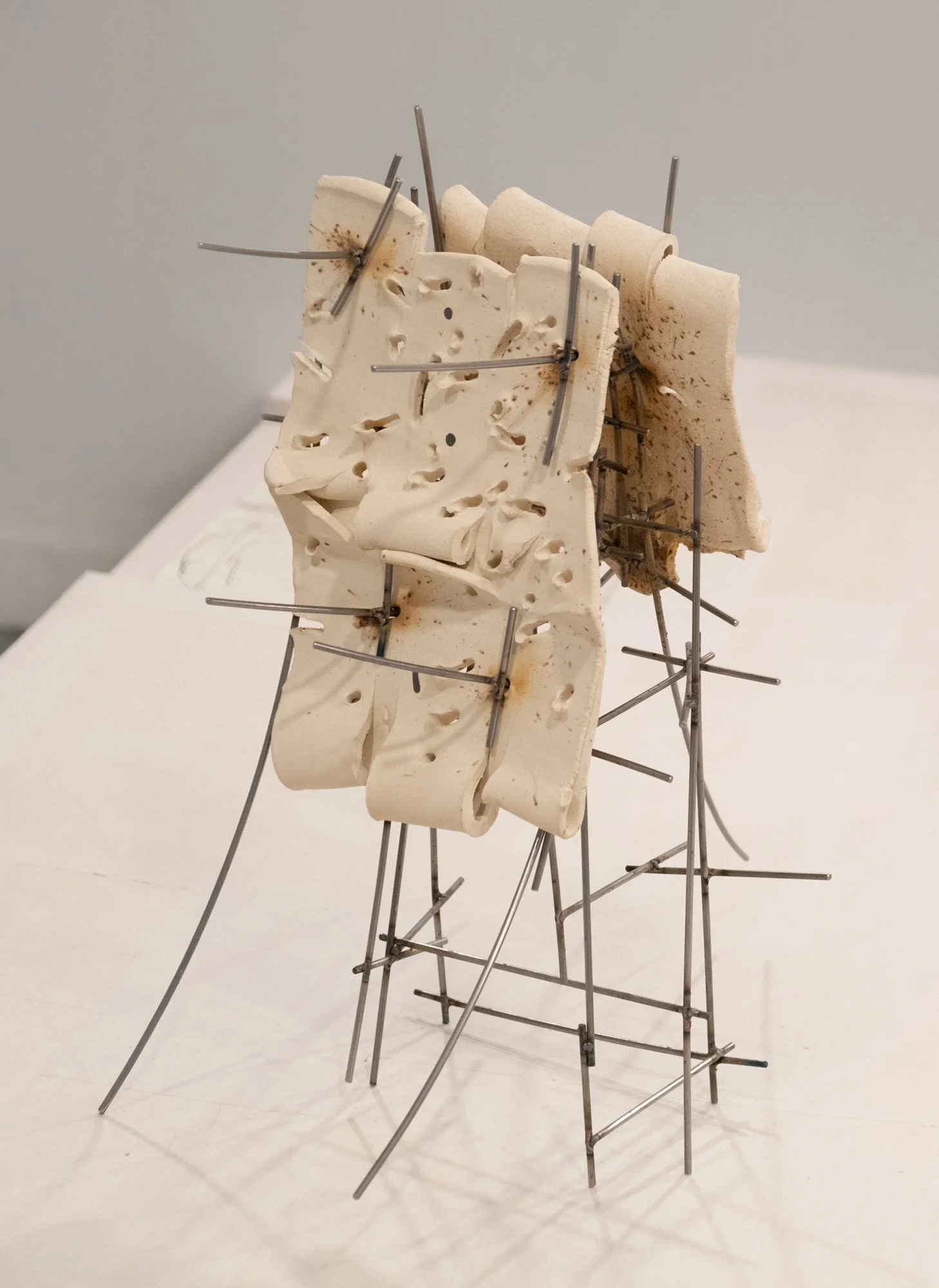   Dancers 6 , 2025, ceramic with glaze details and welded steel, 17h x 18 x 10in   Courtyard , 2026, Site-Service, Nine, New York 