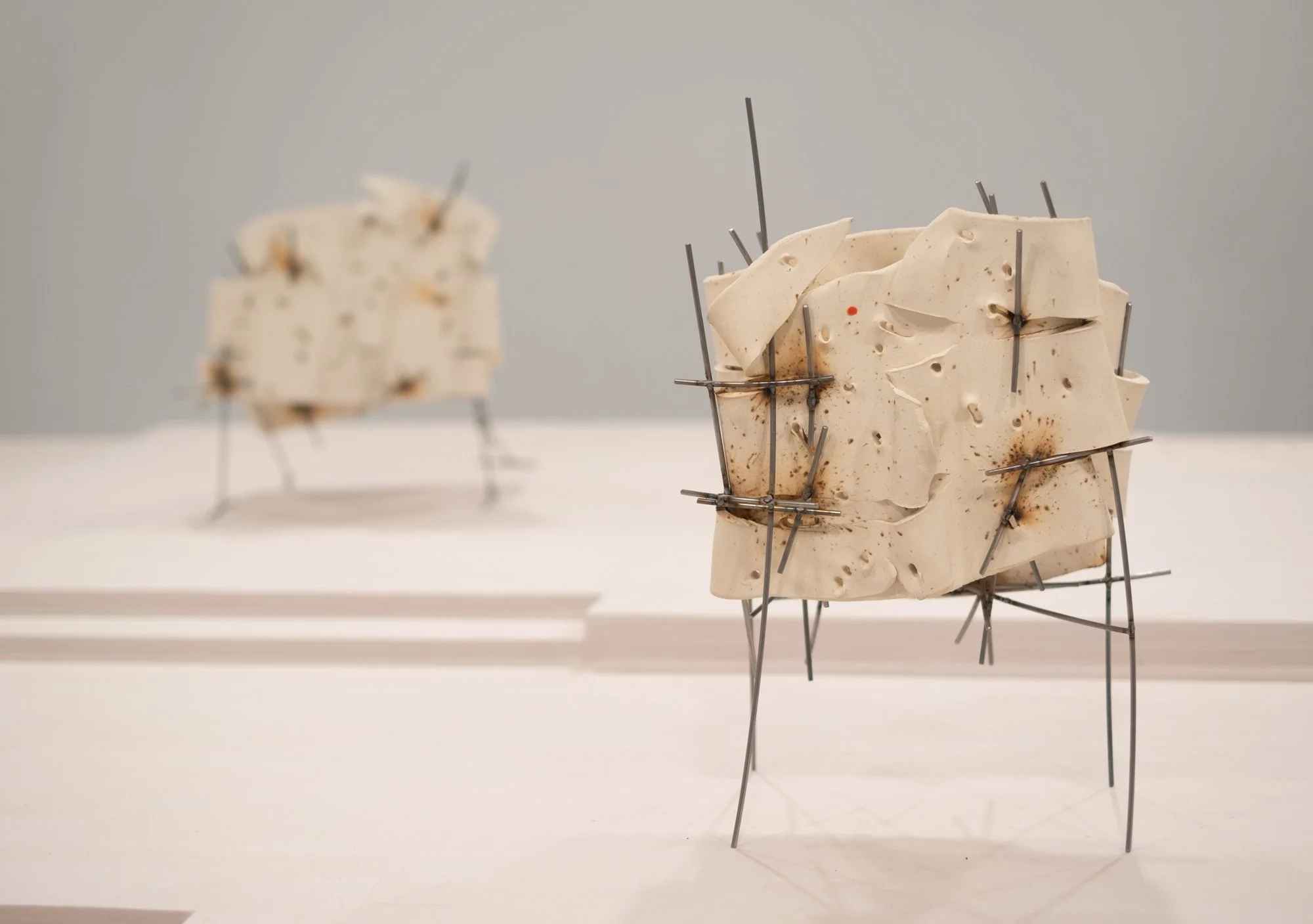   Dancers 9 , 2025, ceramic with glaze details and welded steel, 16h x 11 x 7in   Courtyard , 2026, Site-Service, Nine, New York 