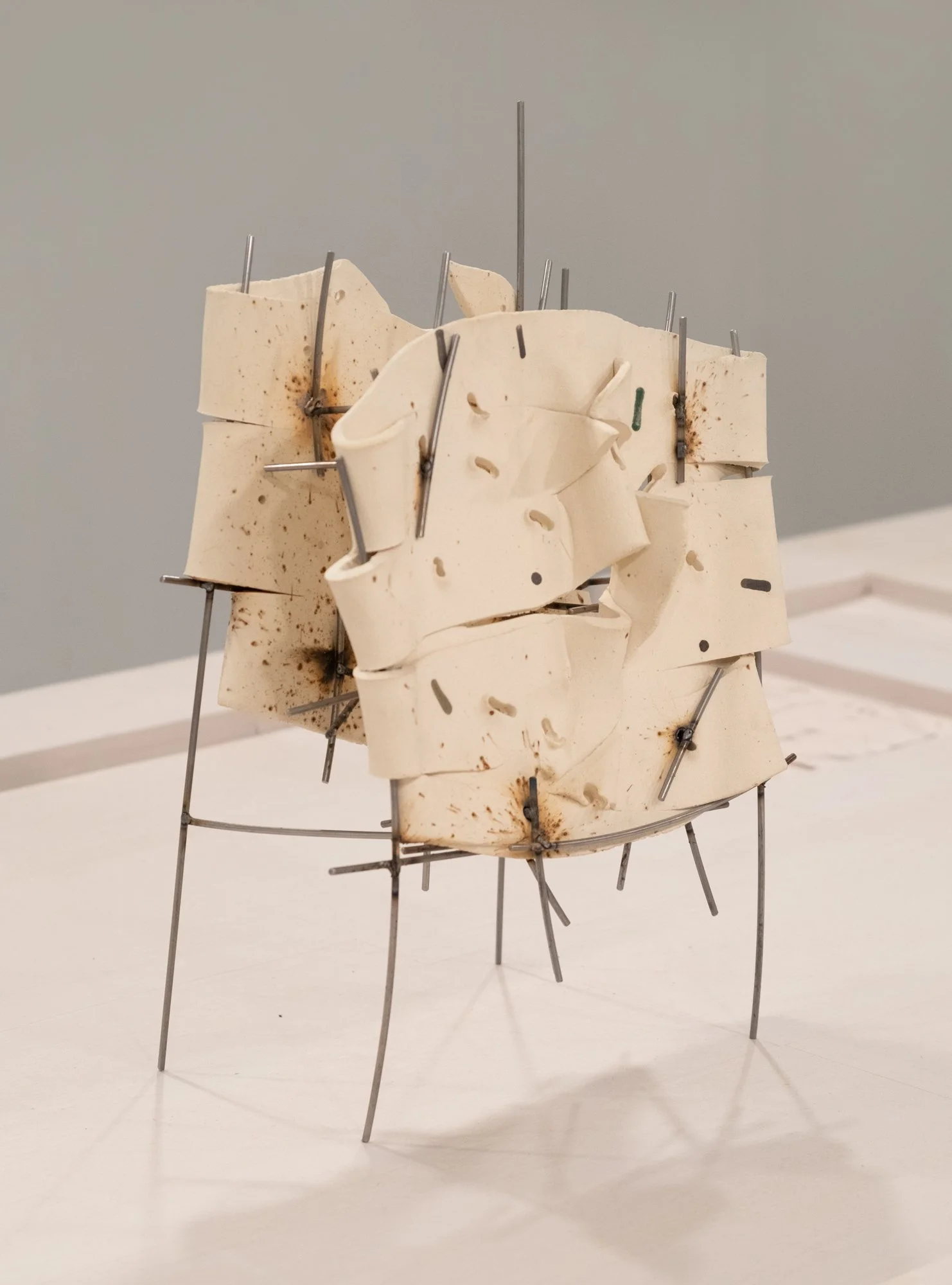   Dancers 9 , 2025, ceramic with glaze details and welded steel, 16h x 11 x 7in   Courtyard , 2026, Site-Service, Nine, New York 