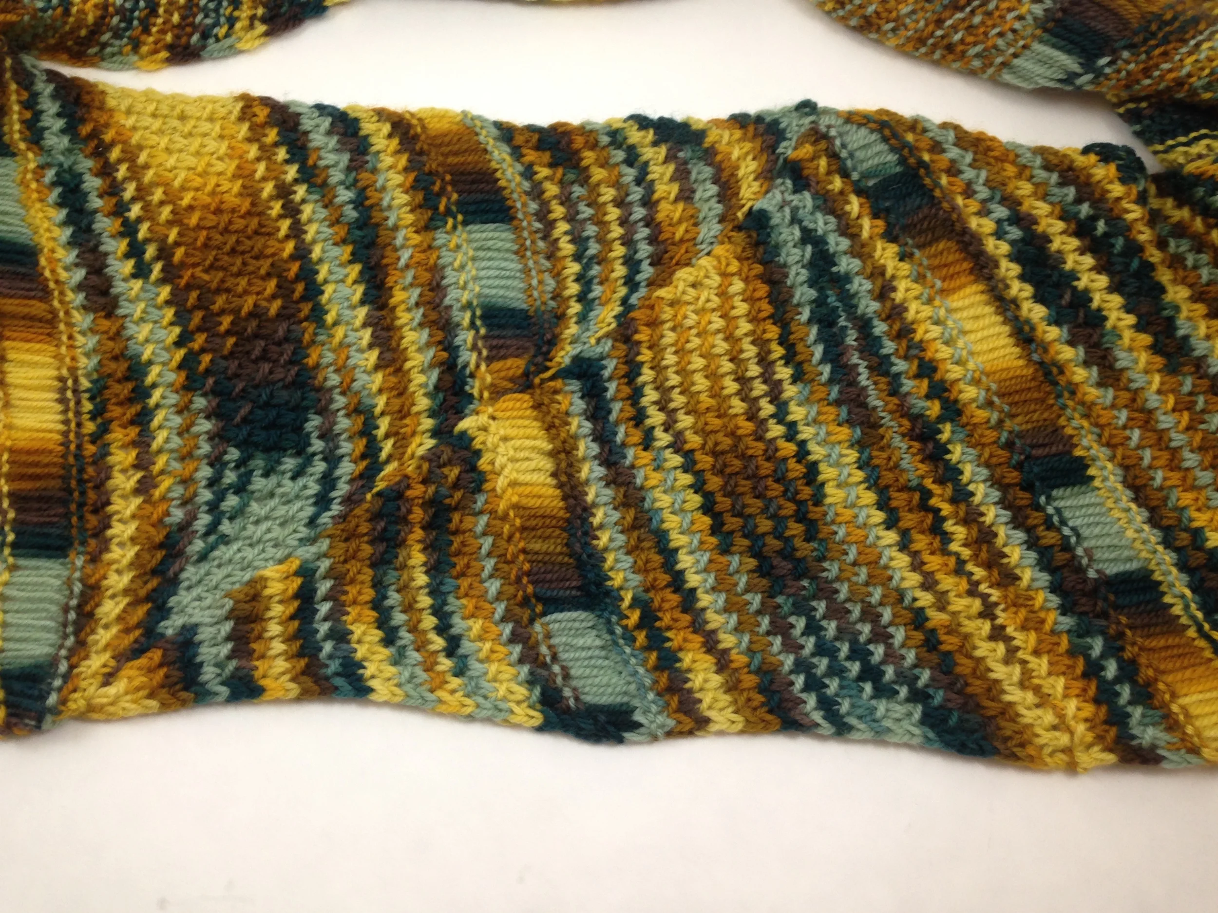 Use mattress stitch to seam along this edge, making sure to line up the drop stitch sections. This creates one long loop cowl!